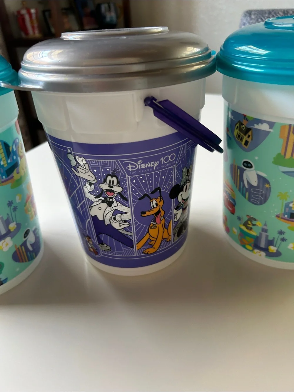 Disney Popcorn Buckets with Teal and Silver Lids